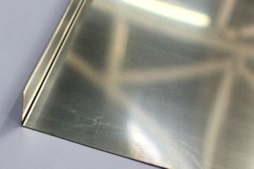 Imagem de chapa de aço inox, utilizado nos serviços de caldeiraria, oxicorte e corte a laser.
